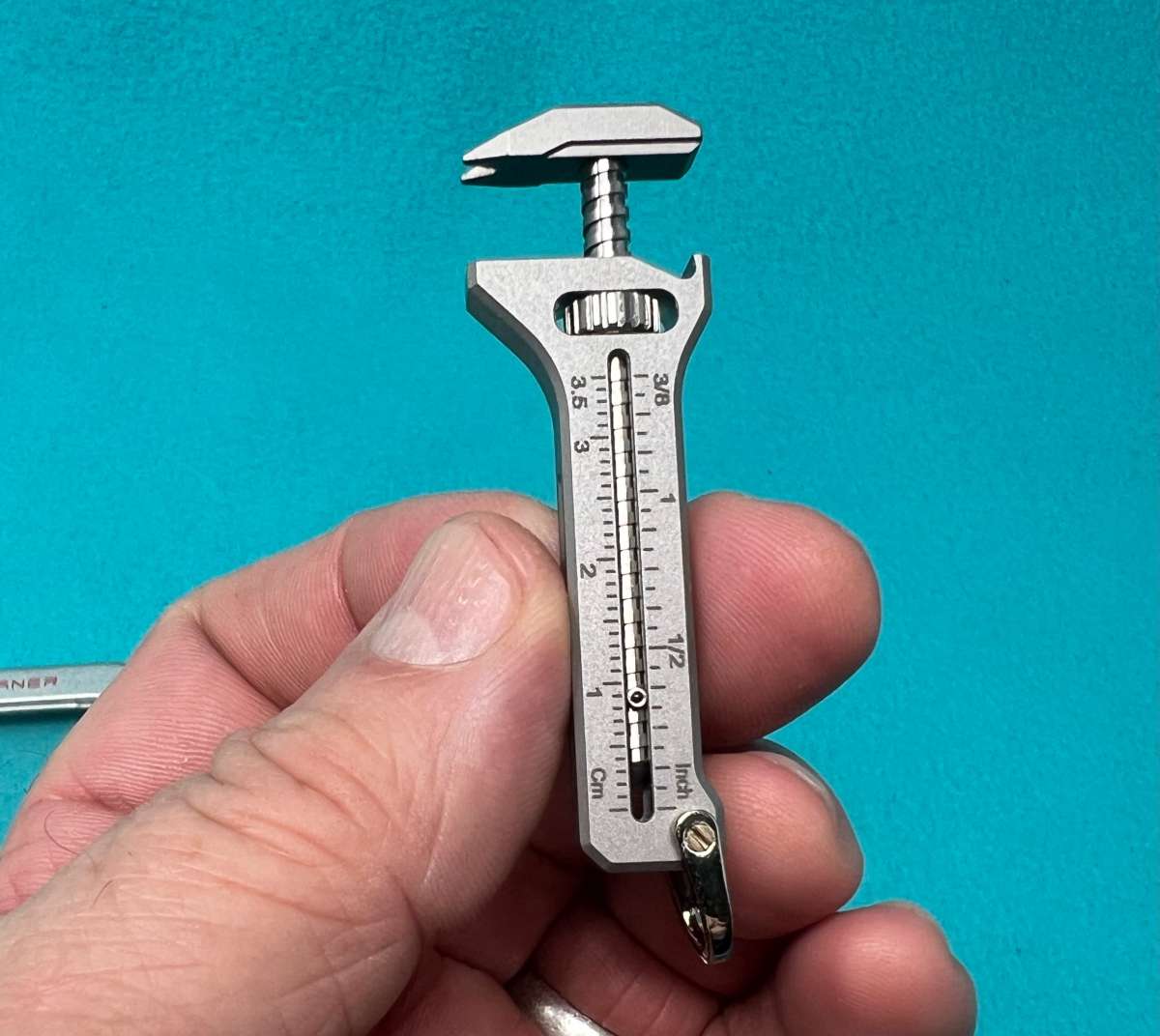 TiSpanner 2.0 Compact Titanium Multitool – Adjustable Wrench, Nail Puller, Caliper, Tungsten Window Breaker, Phone Stand & Bottle Opener – Premium EDC Keychain Tool (Titanium/Stainless Steel)